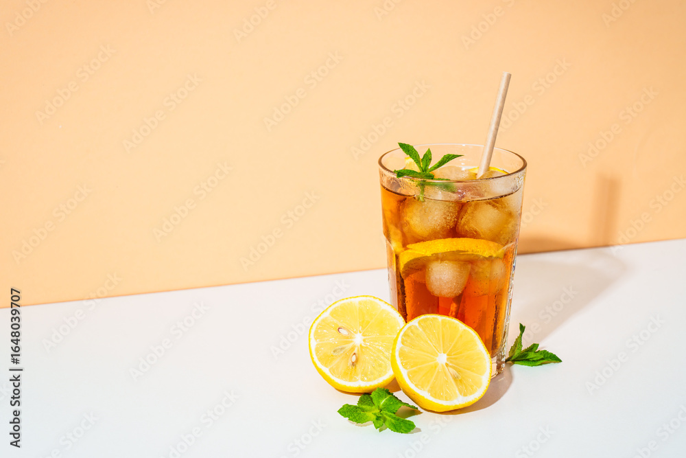 Fototapeta premium Summer cold drink on colored background with hard shadows.