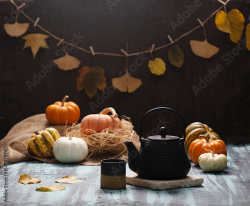 Autumn Pumpkins with black cast iron tea pot and cup