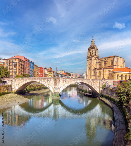 Picturesque view of the Nervion river, San Antón Bridge and the Church of San Antón in the old town of Bilbao, Biscay, Basque Country, northern Spain