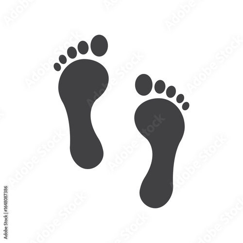 This image presents two dark footprints against a stark white backdrop, symbolizing journey, presence, and the simple act of walking. The minimalist design highlights the human experience.