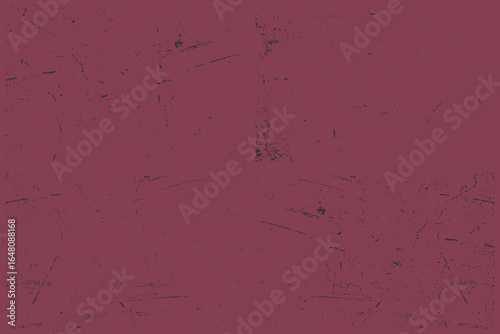 A textured surface in a maroon color with many scratches. This image showcases a rough texture, creating an interesting background suitable for a variety of design purposes.