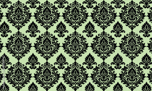 Damask seamless pattern with black floral ornament on light green