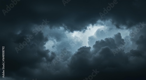Dramatic dark storm clouds with moody atmospheric lighting, perfect for weather forecasting and climate change concepts
