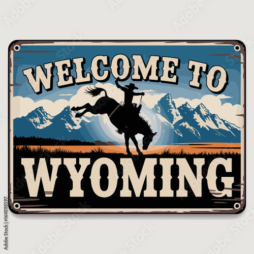 Classic Welcome to Wyoming Sign with Cowboy and Bucking Horse