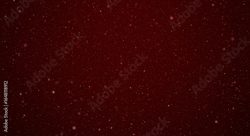 Rich burgundy red bokeh background with soft glowing particles and warm ambient lighting for elegant holiday presentations