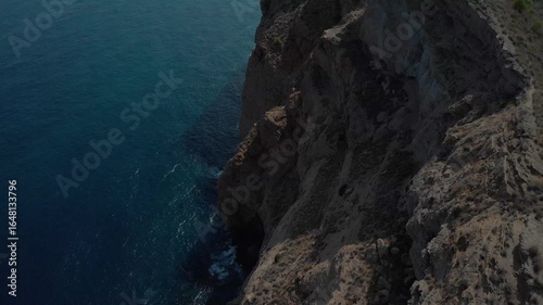 Dramatic ocean cliffs and waves along Costa Blanca coastline