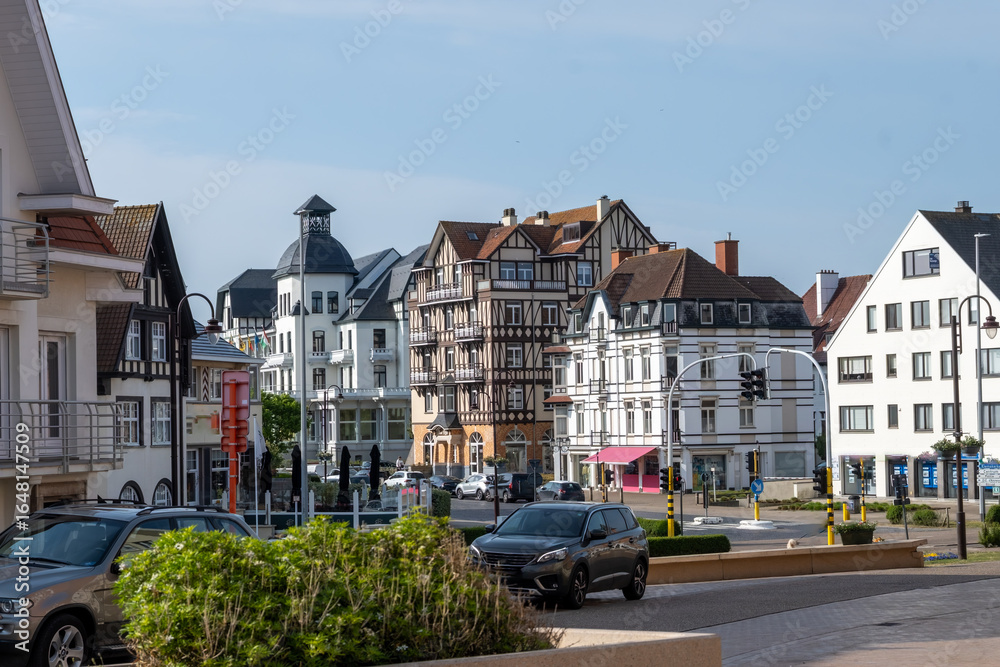 Fototapeta premium Cosy seaside holiday village on North Sea, built in belle epoque style in Flanders, De Haan or Le Coq sur Mer, Belgium