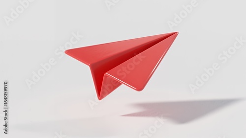 Wallpaper Mural A single red paper airplane floats in mid-air against a clean, minimalist white background, casting a soft shadow below. Torontodigital.ca