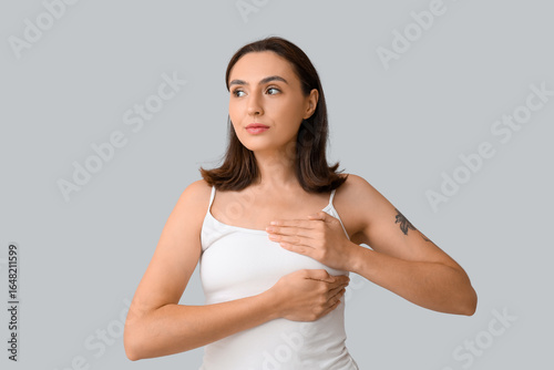 Young woman checking her br...
