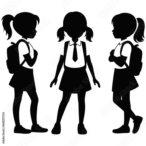 Silhouettes of schoolgirls