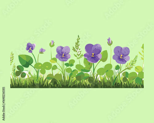 Spring garden border with pansy flowers and fresh greenery