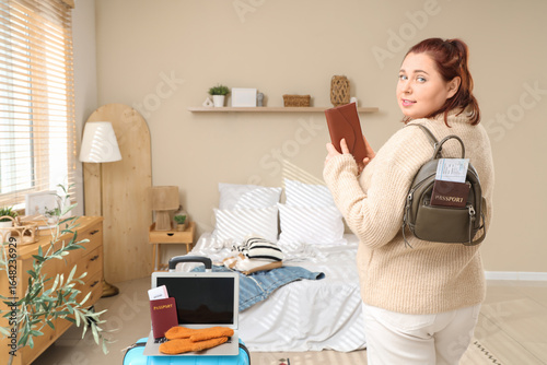 Young woman with wallet and...