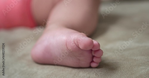 Child foot tickled by finger 4k