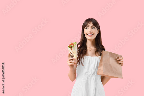Young woman with tasty sand...