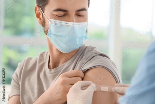 Young man with doctor apply...
