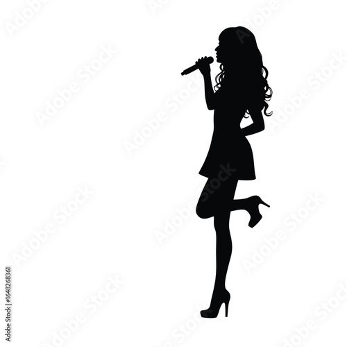 Silhouette of a woman singing into a microphone performer