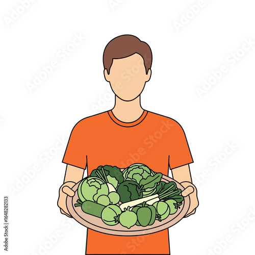 A faceless man in an orange shirt holds a large platter full of fresh green vegetables.