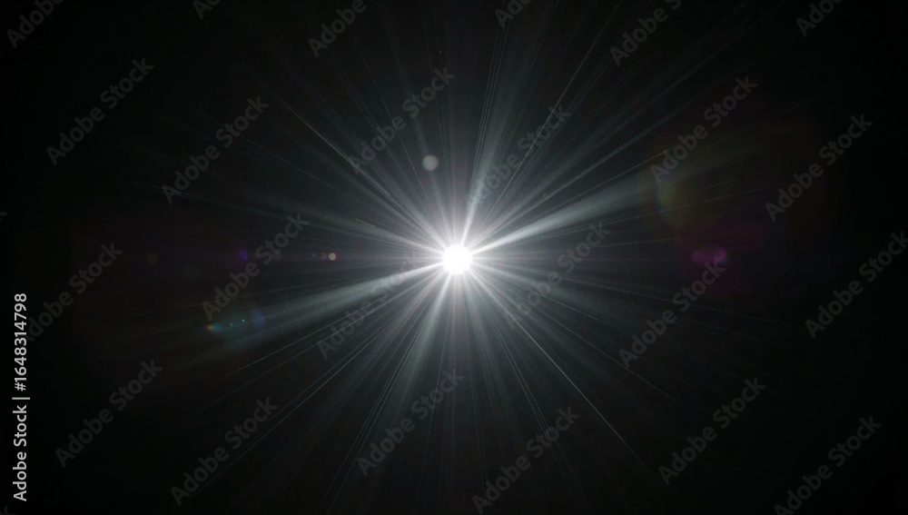 Fototapeta premium Bright lens flare with radial light rays on a dark background