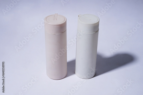 Two Plain Tumbler Bottles on a White Background