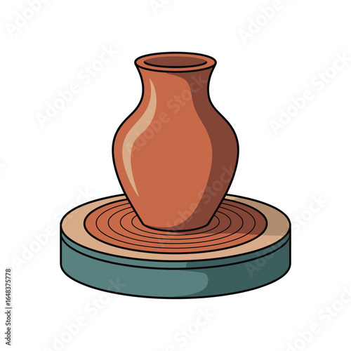 Clay pot on a pottery wheel with concentric rings and teal base ceramic