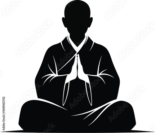 A silhouette of monk in meditation pose, symbolizing peace, serenity, and spiritual enlightenment