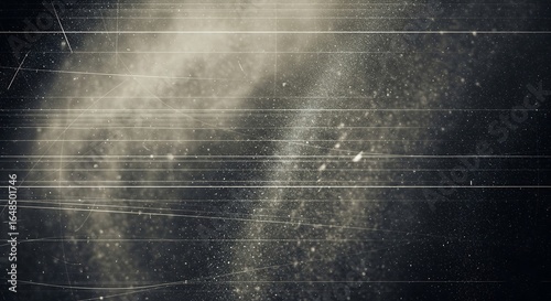 Abstract texture background with light streaks dust particles and scratches in a dark grayscale cinematic atmosphere