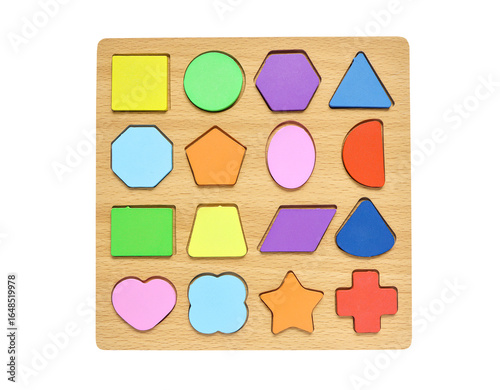 Wooden geometric shapes. Puzzle game education on white background with clipping path from above.