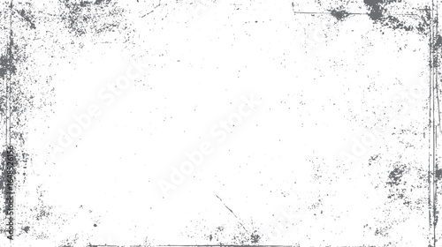 Grunge texture background with distressed edges and scattered speckle patterns. Vintage worn surface effect with rough corner details.