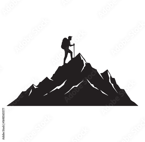 Silhouette of a hiker standing on a mountain peak reaching the summit successfully