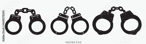 A set of four black handcuffs with chains on a white background