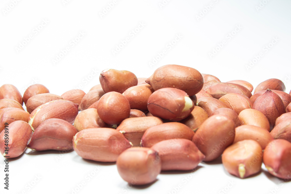 Peanuts close-up on white background Peanuts close-up on white background