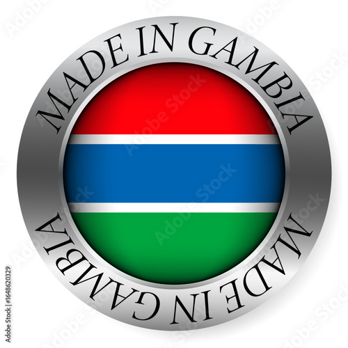 Made in Gambia button icon. Circular emblem with metallic border, glossy central flag, and bilingual label indicating product origin and international manufacturing identity.
