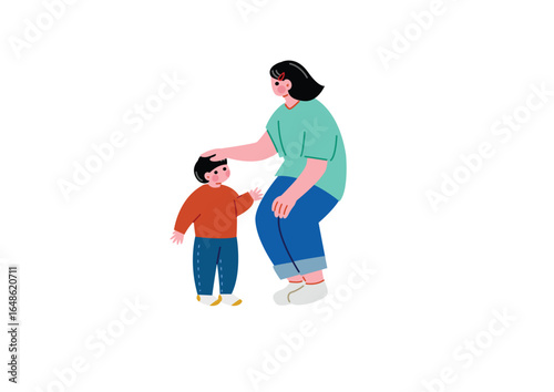 小さな男の子の頭を撫でる女性