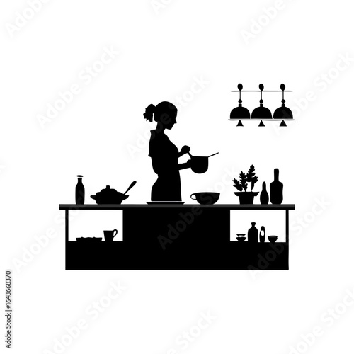 Silhouette of woman cooking at kitchen counter with hanging lights