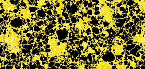 Abstract pattern of black and yellow splatter