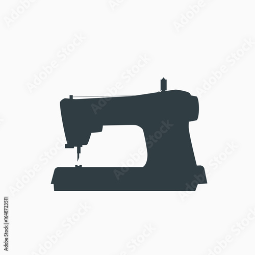 a sewing machine icon on white back