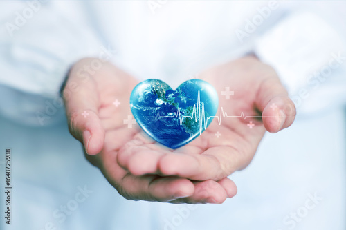 Fototapeta Naklejka Na Ścianę i Meble -  World heart day. health care medical focus heartbeat for checking the function of the patient heart. health insurance, love. heart attack and cardiology. elements of this image furnished by NASA.
