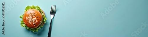 Wallpaper Mural Delicious hamburger with fork on blue background Torontodigital.ca