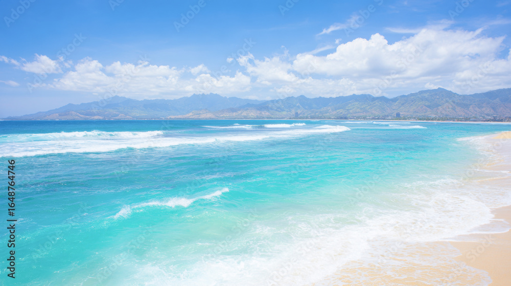 Obraz premium Luxurious tropical resort overlooking golden sand and turquoise waters with mountain backdrop