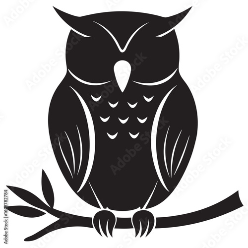 A owl siting in a trees branch body in front stari