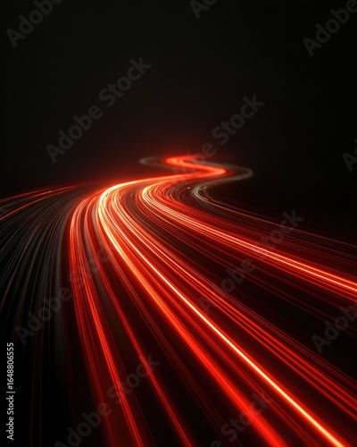 Abstract light trails curving through darkness