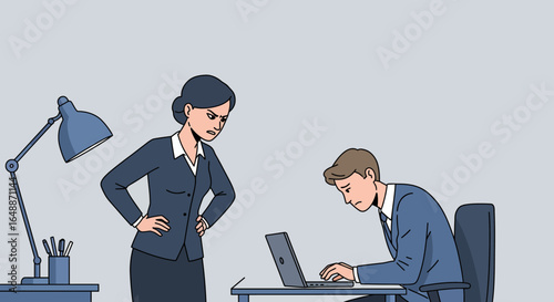 Boss glares at employee working at laptop in office
