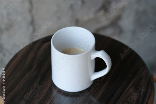 cup of coffee on wooden table