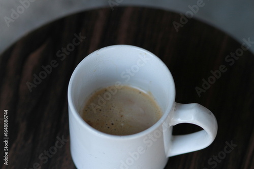 cup of coffee on black background