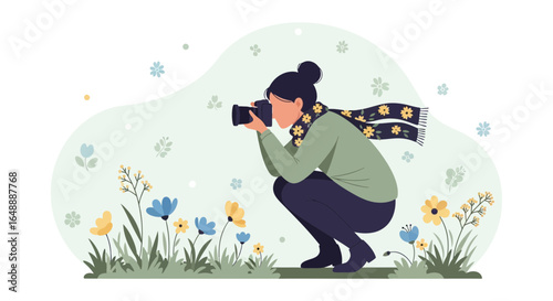 A female photographer captures the beauty of nature amidst blooming flowers outdoors in spring season