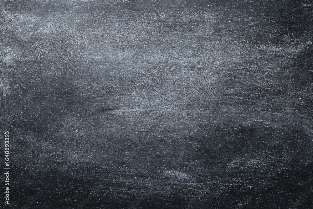 Fototapeta premium Textured dark gray surface with subtle shading