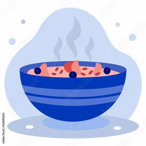 Oatmeal bowl with steaming porridge and fruits on a blue background  