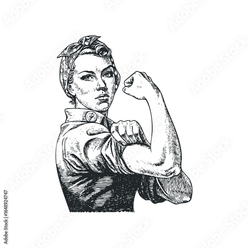Woman flexing bicep in a determined pose