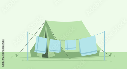 Camping Adventure With a Tent and Clean Laundry Drying on a Clothesline