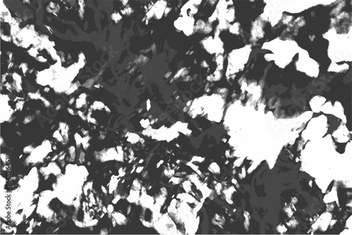 Abstract black and white texture featuring fluid, smoky, and chaotic ink-like patterns. Marbled effect with irregular shapes with organic and expressive swirling liquid, cloud formations